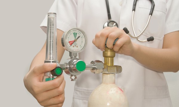 Image of Nurse Administerin Oxygen